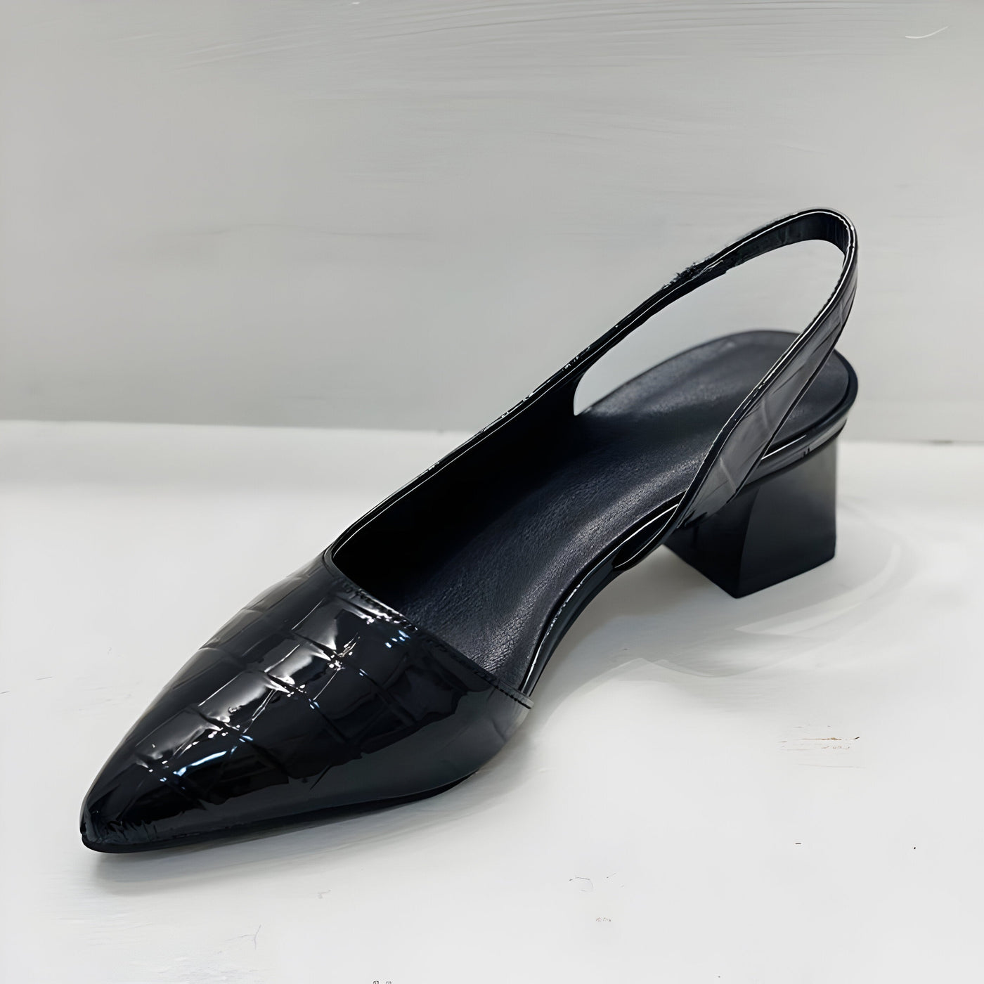 ADELE low-heeled pumps with open heels